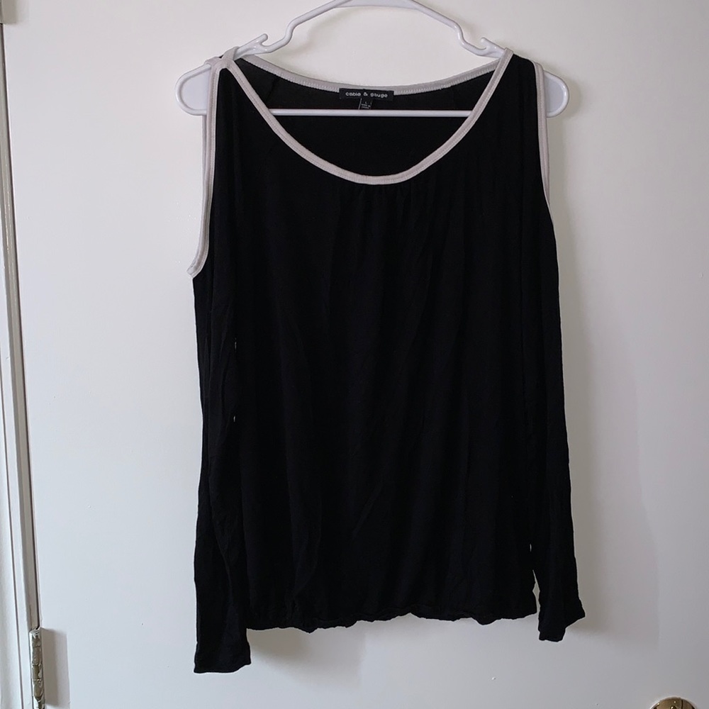 Black and white shoulder revealing long sleeve.